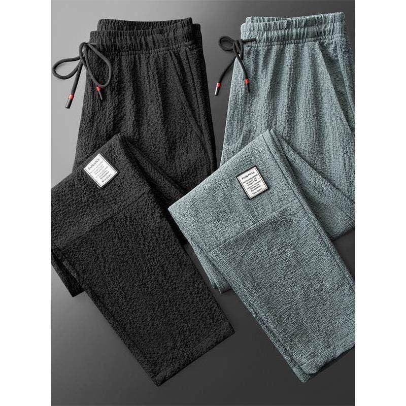 Calças de seda gelo baratas masculinas Street Wear tornozelo comprimento solto mais gordura plus Size gravata pé calças