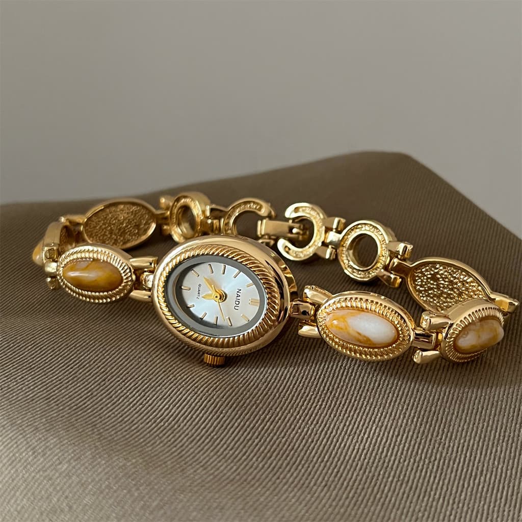 Novo relógio de pulso vintage de luxo leve, vendido diretamente, elegante e retrô, pequeno relógio dourado para mulheres