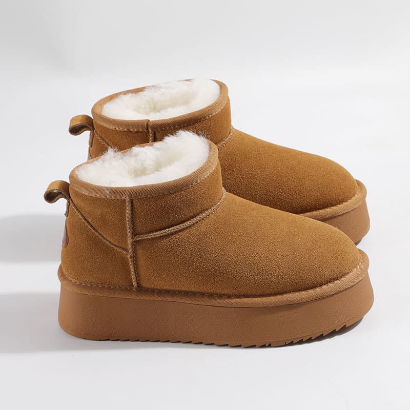 Botas de neve de lã de couro genuíno genuíno feminino pele de carneiro de sola grossa integrada 2025 inverno engrossado