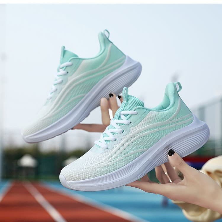 Primavera outono novo estilo voando malha tênis feminino malha leve sola macia absorção de choque Ultra-leve tênis de co