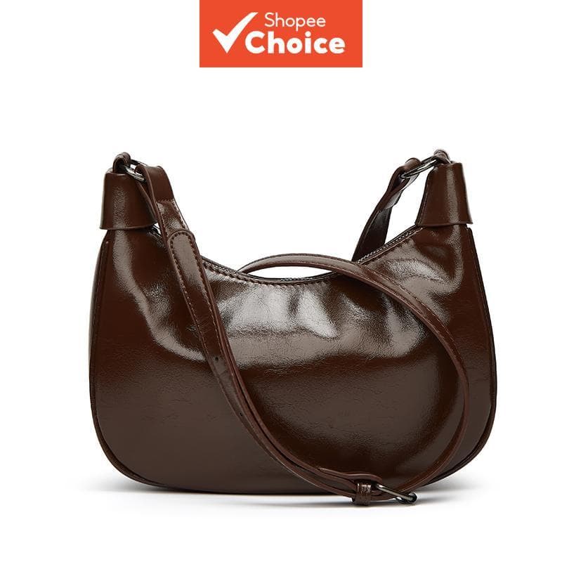 Bolsa feminina tiracolo com alça ajustável, ideal para passeios, trabalho e compras.