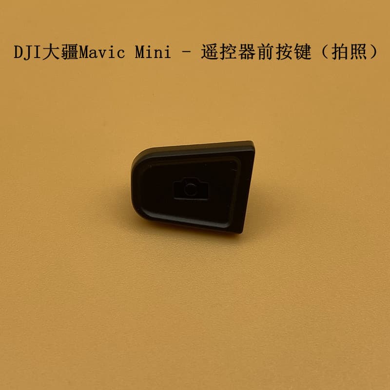 Botão frontal do controle remoto DJI Mavic Mini para tirar fotos. Botão do controle remoto Mavic Mini para tirar fotos.
