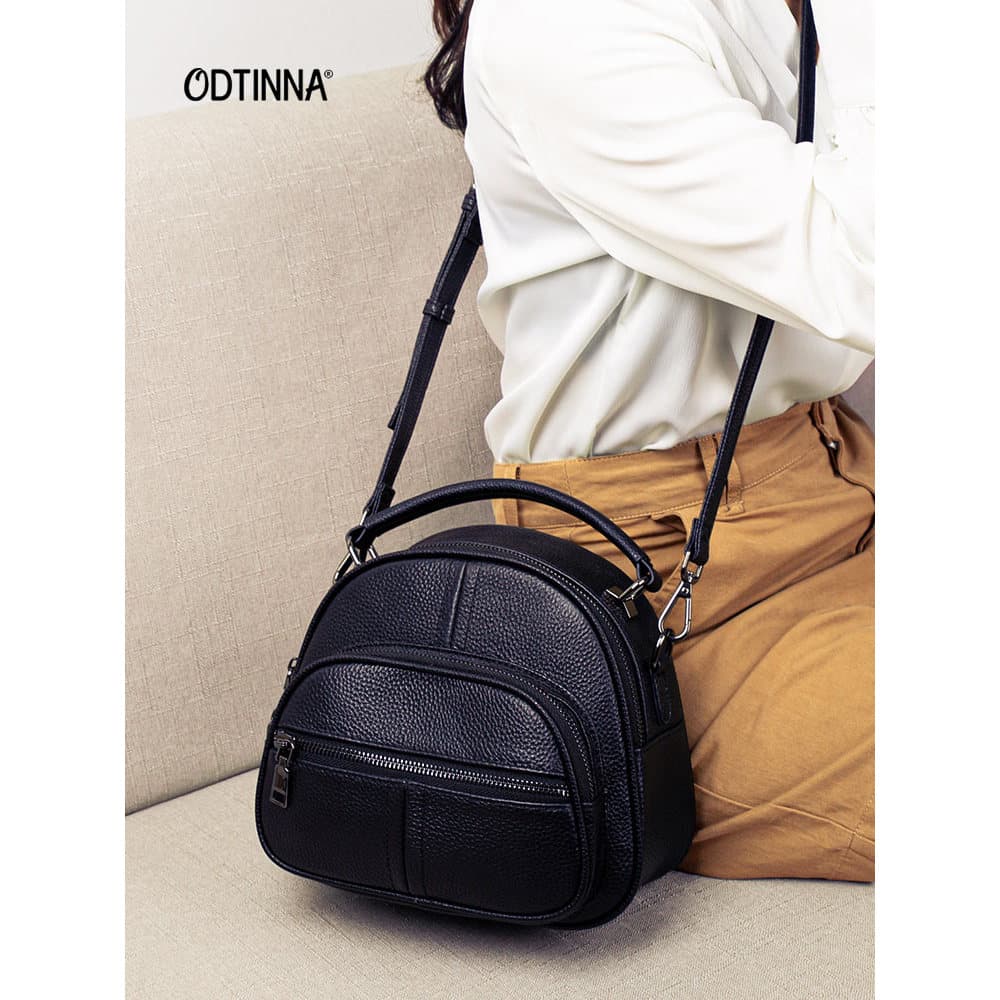 Bolsa multiuso de couro genuíno feminina 2026 novo estilo moda mochila feminina All-Match bolsa mensageiro de um ombro m
