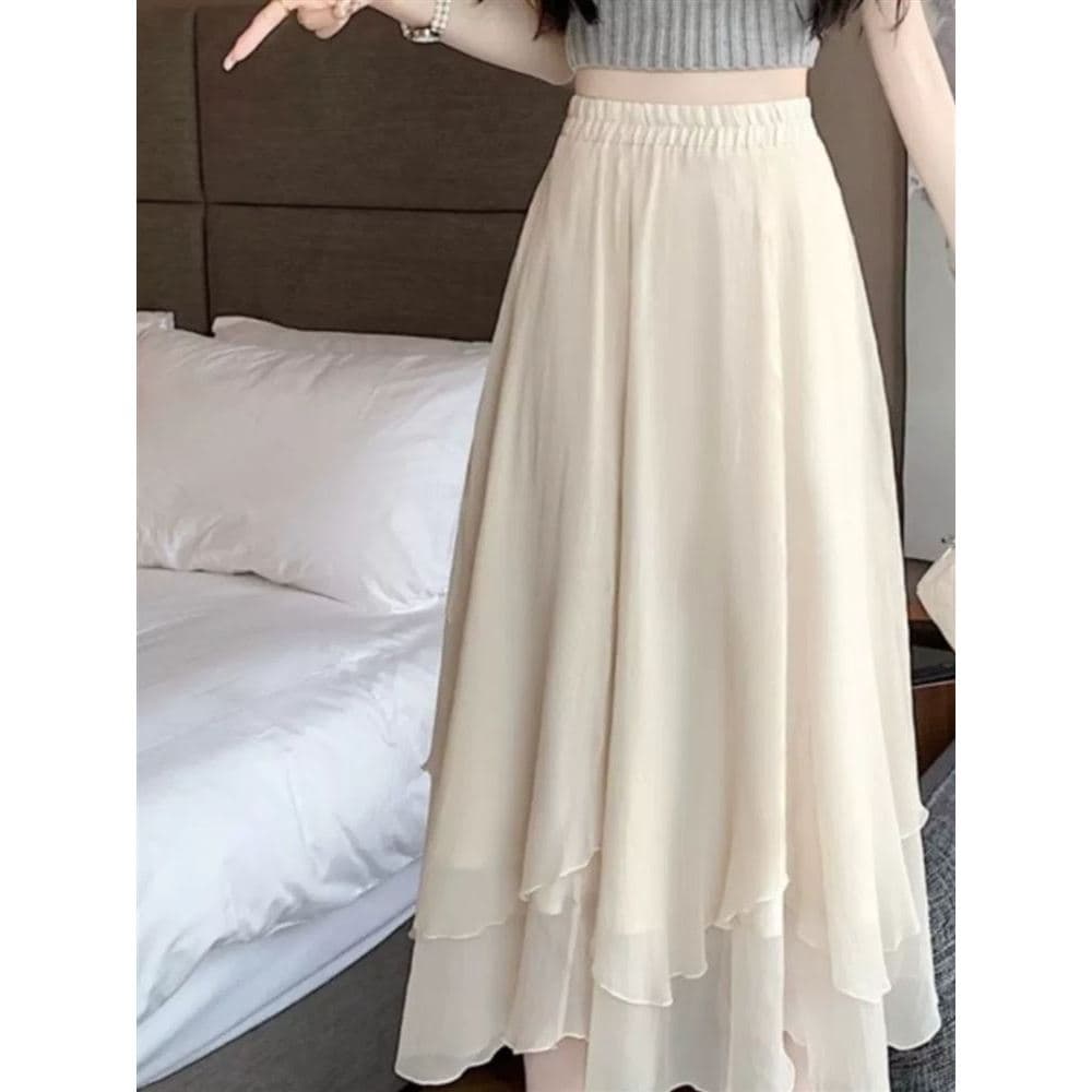 Saia feminina verão saia longa estilo fino 2023 novo estilo cintura alta Design sentir a linha longa saia de malha Irreg