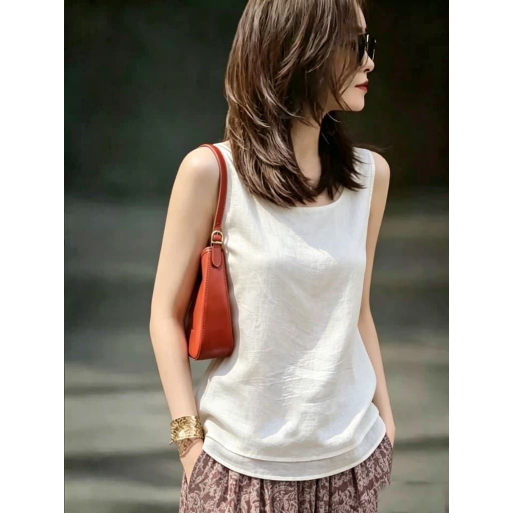 Estilo preguiçoso colete de linho branco feminino verão exterior Wear 2026 novo estilo pescoço quadrado sem mangas inter