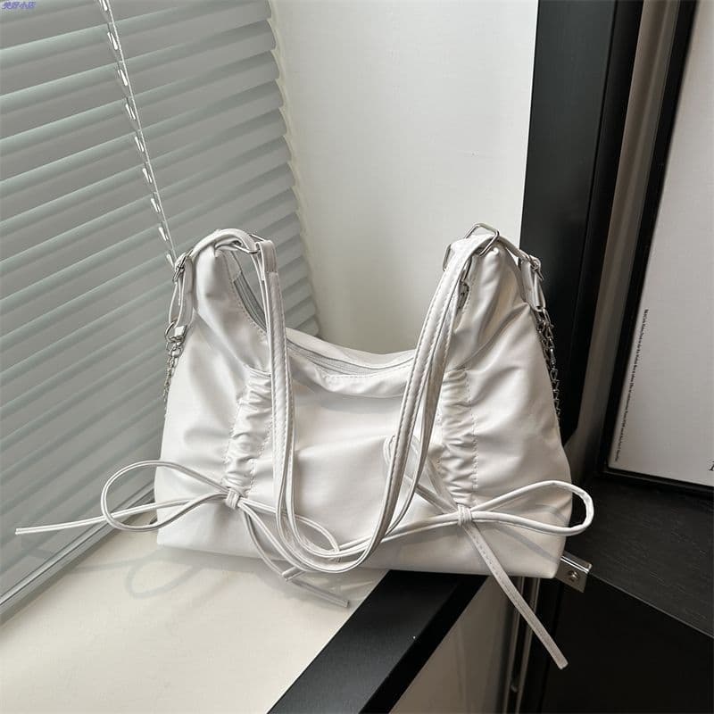 Plissado arco mochila saco feminino 2024 novo estilo na moda doce sacola Casual bolsa de ombro de grande capacidade