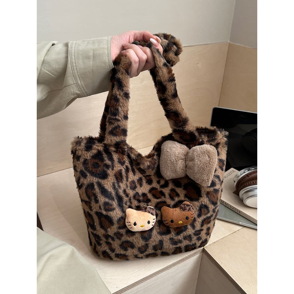 Outono inverno peludo balde saco feminino 2026 novo estilo bonito dos desenhos animados peludo portátil grande capacidad