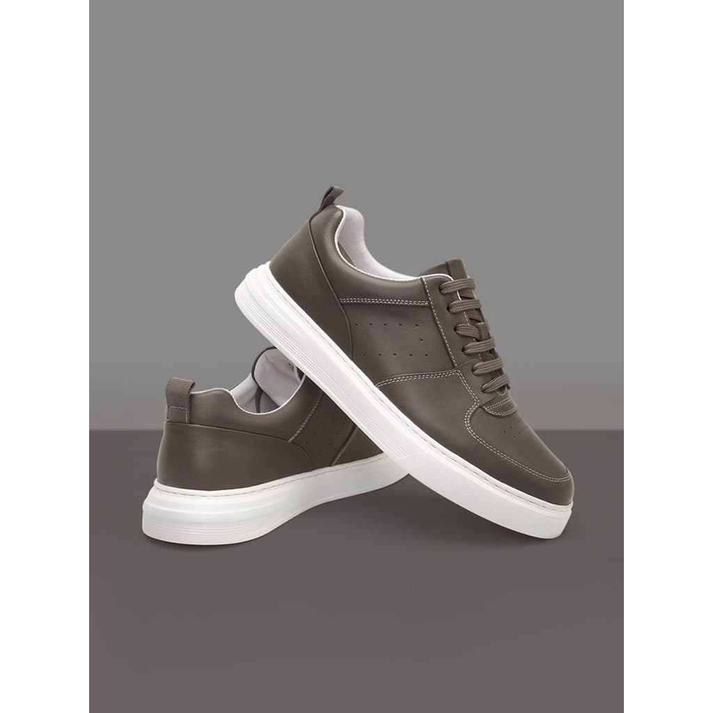 Tênis de couro genuíno masculino completo primavera novo estilo leve sola macia High-End dedo do pé camada esportes sapa