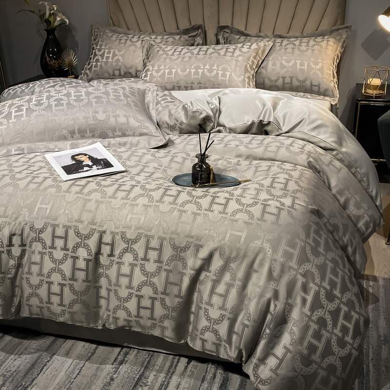 Luz de luxo High-End seda gelo conjunto de quatro peças sedoso nu dormir lavável cama dormitório três peças colcha capa
