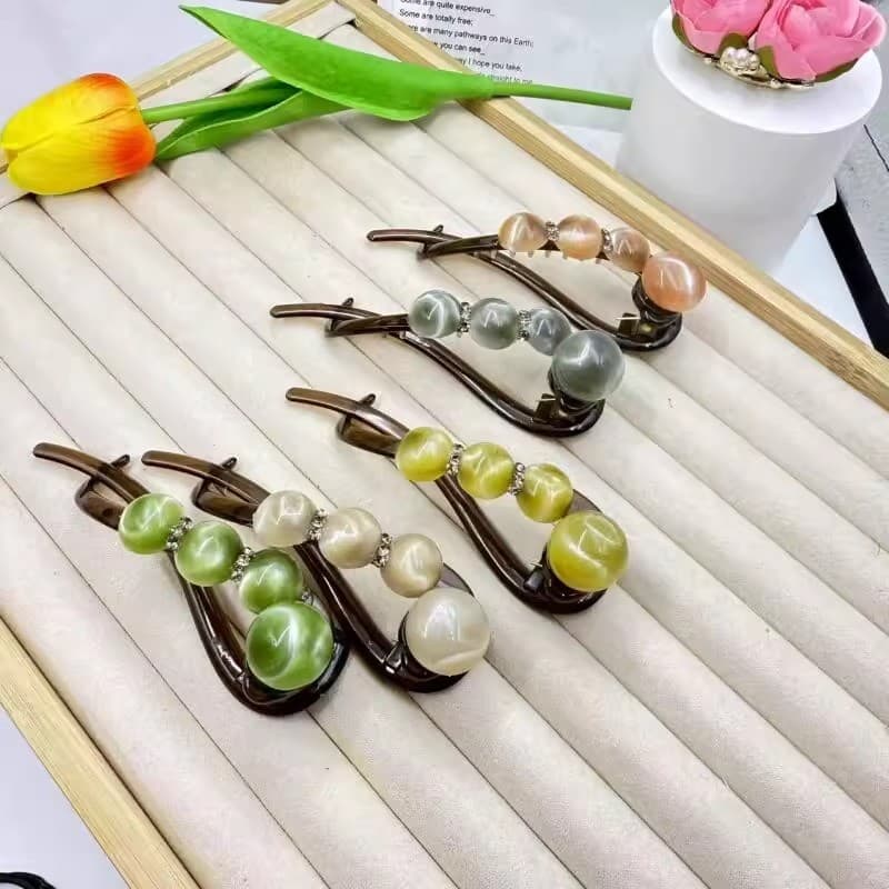 Verão simples fácil de usar disco cabelo uma palavra dentado torção clipe feminino 2025 novo estilo Grab clip grânulo de