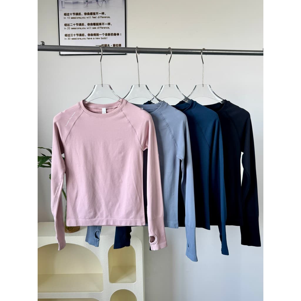 Roupas de Yoga profissionais femininas de manga comprida magro olhar elástico esportes camiseta correndo Brea