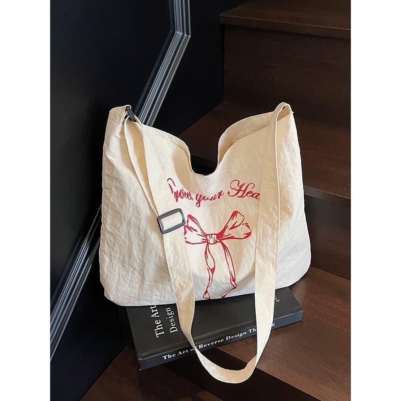 Bolsa de lona feminina de grande capacidade 2026 novo estilo verão All-Match simples saco de compras de um ombro faculda