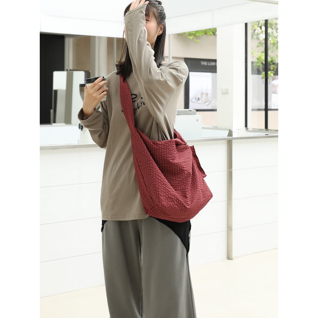 Coreano Casual verificado sacola feminina All-Match textura náilon Cross-corpo mensageiro saco nicho Commuter um-Shoul