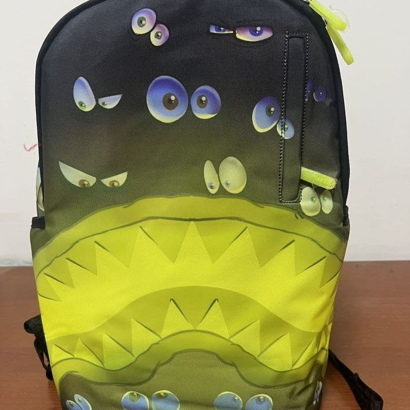 Qionghai City Wuqiao Comercial Co., Ltd. SG Shark Mouth NASA Co-Branded Mochila Fluorescente Luminosa Impressão Completa