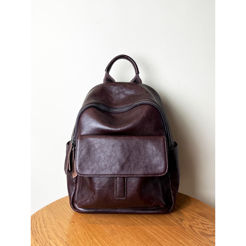 Retro couro genuíno mochila feminina 2026 novo estilo Casual primeira camada de couro feminino saco de meia-idade mãe se