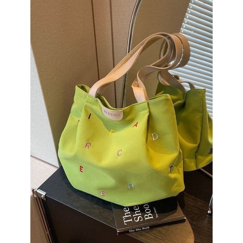 Bolsa de lona de grande capacidade feminina 2026 novo estilo na moda bordado carta sacola estudante fresco um @-