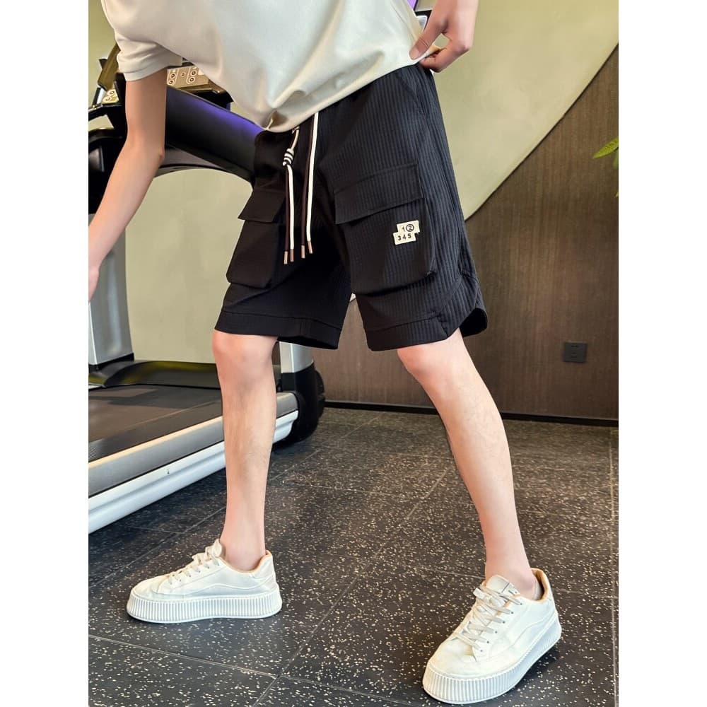 High-End sentido macacão Shorts masculino verão Street Wear rufião bonito fino calças de cinco pontos 2025 novo estilo c
