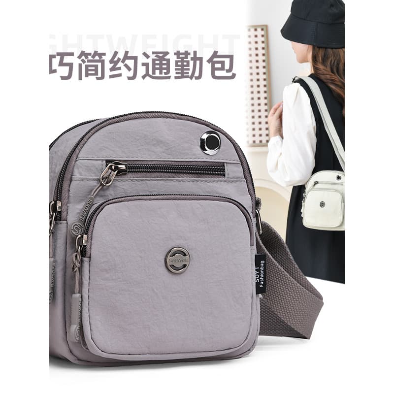 2026 novo estilo leve saco do mensageiro feminino Commuter saco All-Match grande capacidade Multi-camada saco do telefon