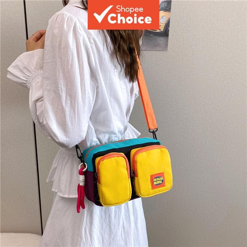 Bolsa tiracolo feminina casual com bloqueio de cores, em nylon, com alça de ombro e chaveiro feito à mão