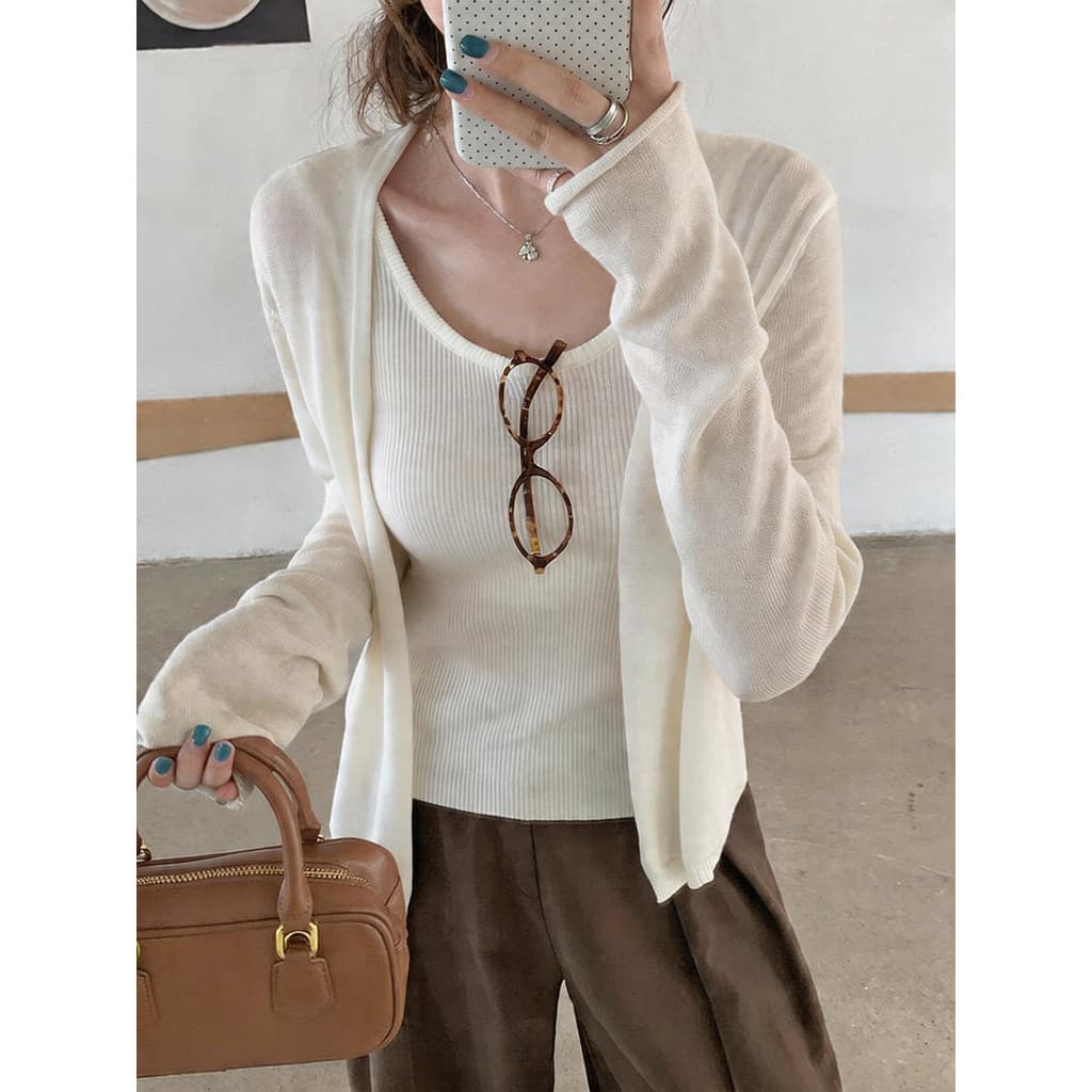 Cardigan de malha protetor solar de manga comprida ceroso macio
Feminino Feminino Feminino Feminino Feminino Feminino Fe