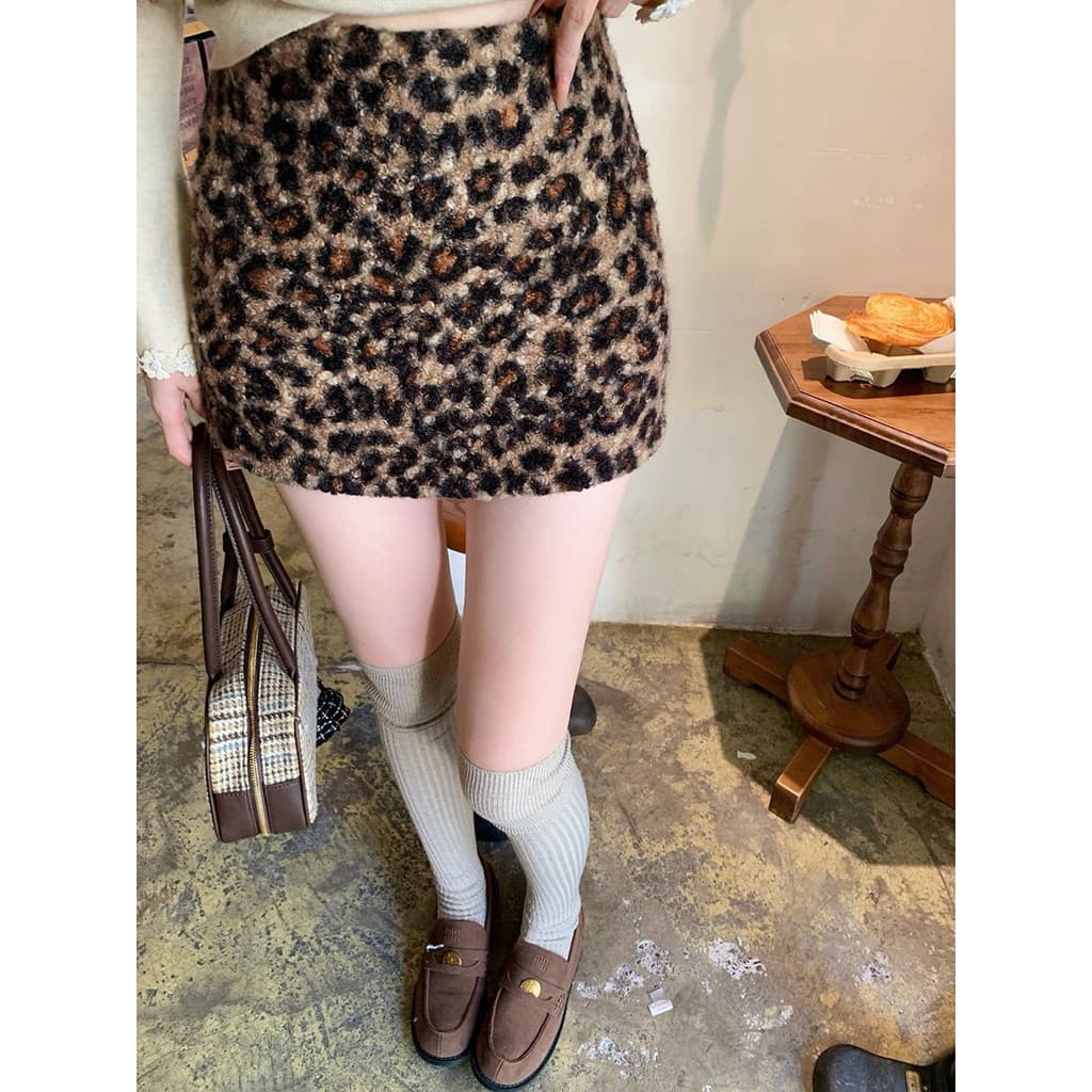 Gordura mm tamanho grande cintura alta temperamento quente menina Anti-reflexo Hip saia feminina primavera a linha leopa
