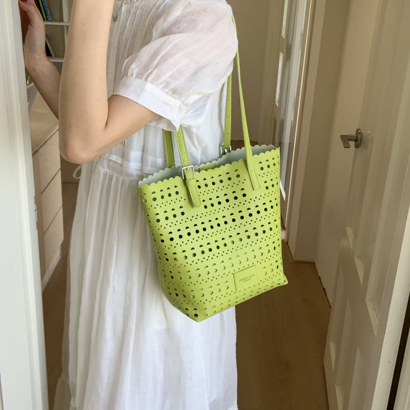 Bolsa de mão vazada, bolsa tipo balde, bolsa de ombro, bolsa de axila, bolsa feminina.