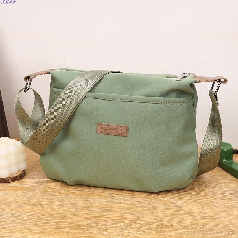 Bolsa leve feminina novo estilo 2024 Oxford pano cruz-corpo pequeno saco High-end moda ombro bolsa de lona simples bolsa