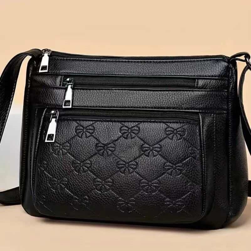 Textura de couro genuíno bolsa feminina de meia-idade bolsa mãe 2024 novo estilo de grande capacidade senhoras idosos um