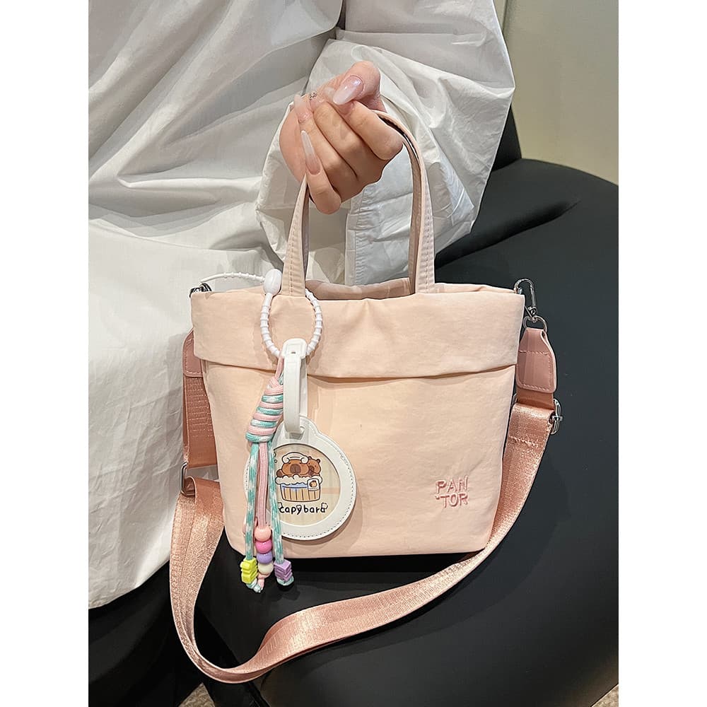 Japão japão coreia balde saco feminino 2025 novo estilo leve saco do mensageiro náilon lona mamãe saco Commuter portátil