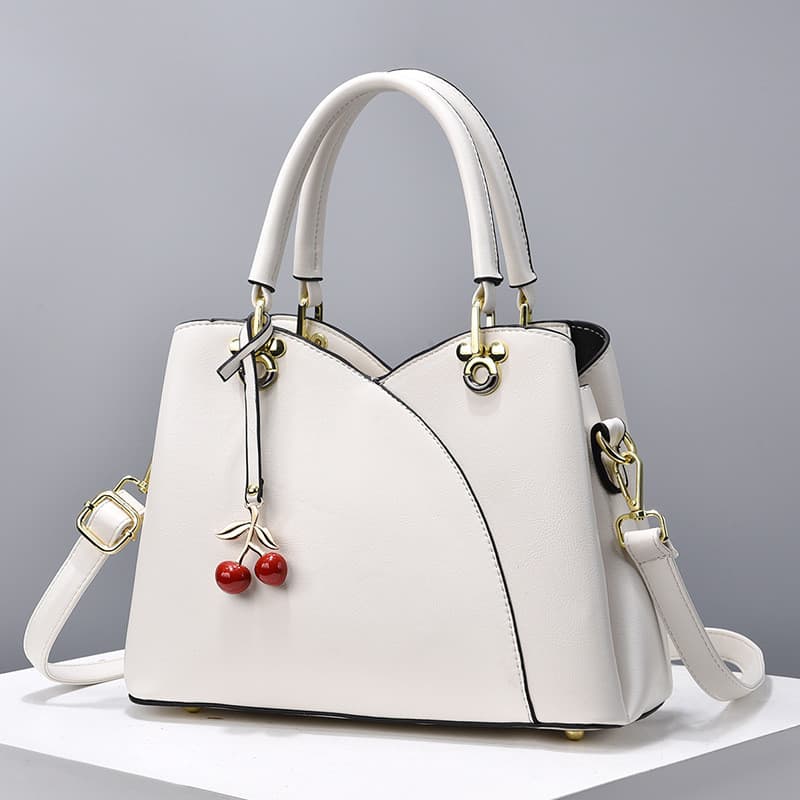 Bolsa grande capacidade 2025 novo estilo cor sólida bolsa feminina mãe bolsa de meia-idade moda All-