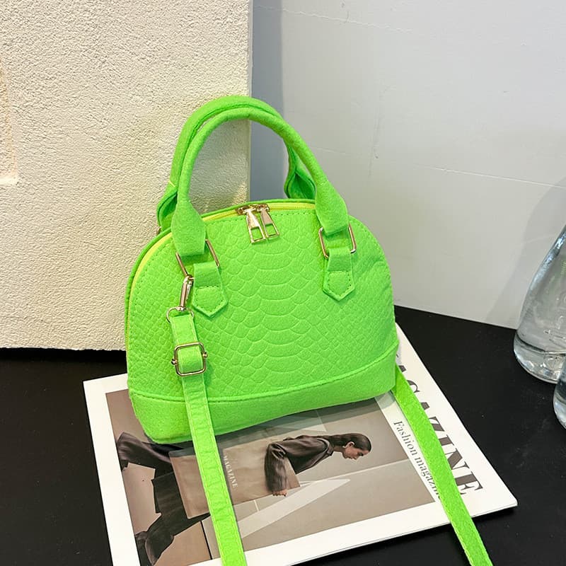 Bolsa feminina 2025 primavera novo estilo versão coreana moda Retro portátil saco de concha simples Casual ombro saco do