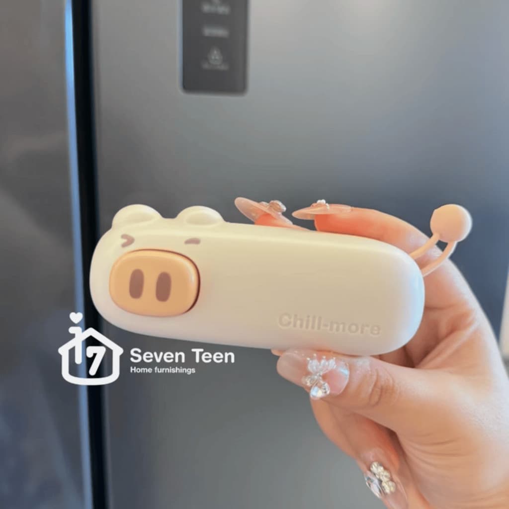 Cute Piggy Household Mini Máquina de selagem portátil Tipo magnético portátil pode ser usado como adesivos de geladeira