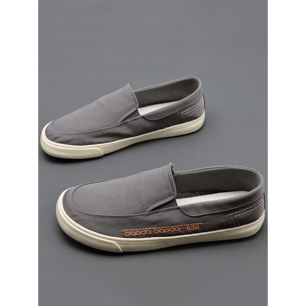 Sapatos de pano masculino 2026 primavera outono novo estilo baixo-Top respirável All-Match deslizamento-On tênis casuais