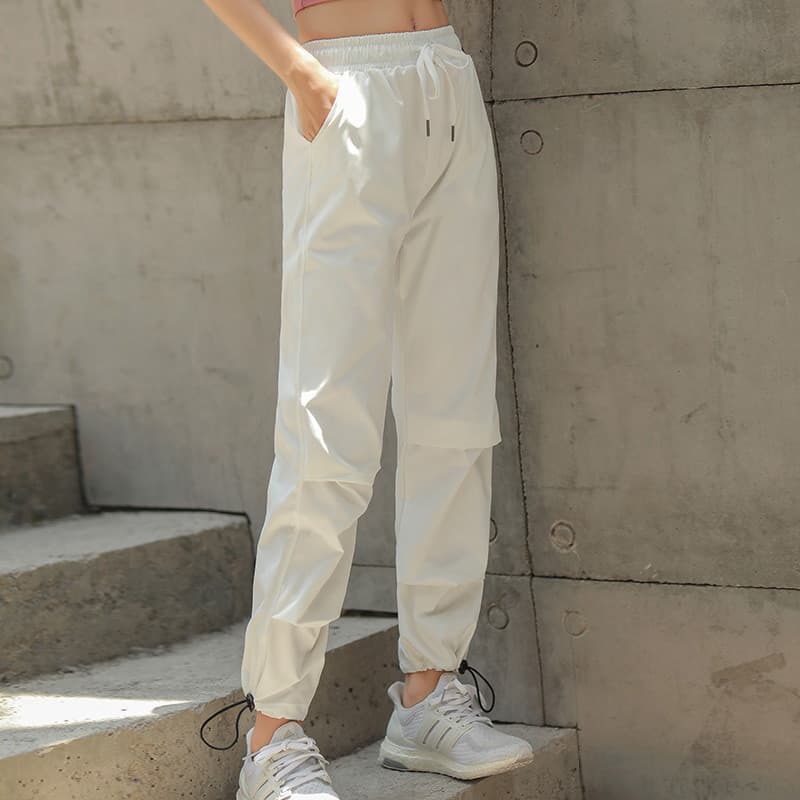 Macacão com vigas feminino solto branco calças de secagem rápida à prova de vento Harem calças casuais ins calças da mod