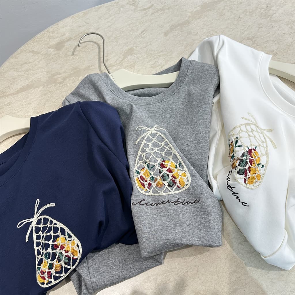 Diversão fruta Net bolso bordado Design de manga curta camiseta feminina verão pequeno solto mais magro olhar frente omb