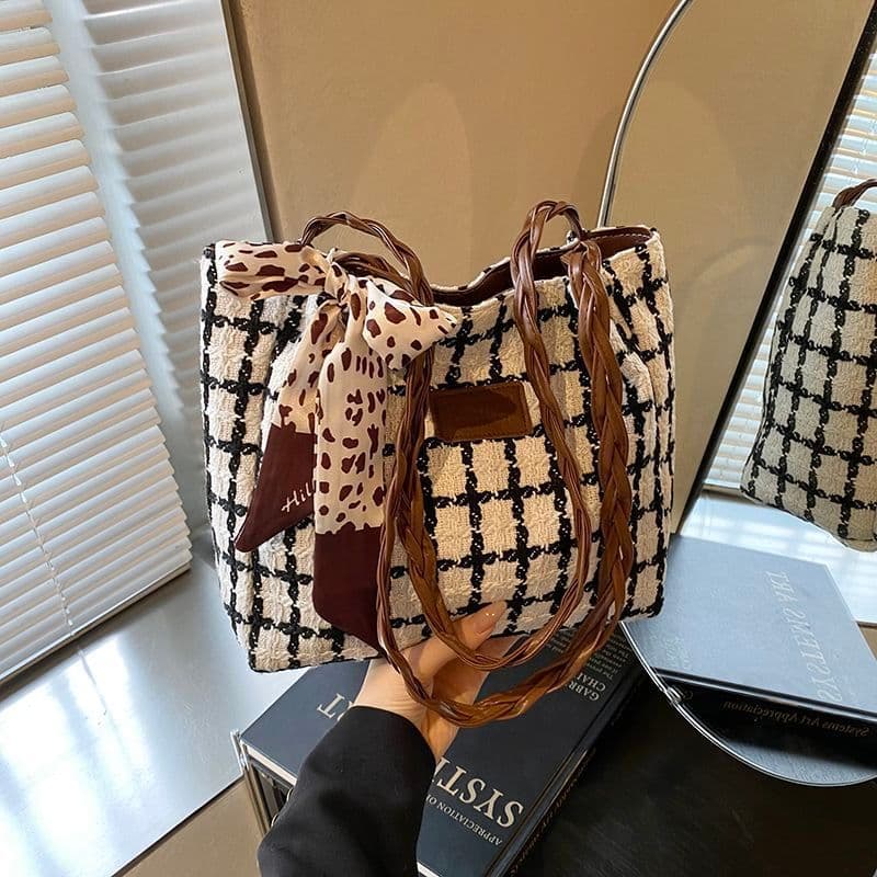 Bolsa feminina 2026 novo estilo versão coreana moda All-Match ins um ombro axilas saco grande capacidade xadrez Commuter