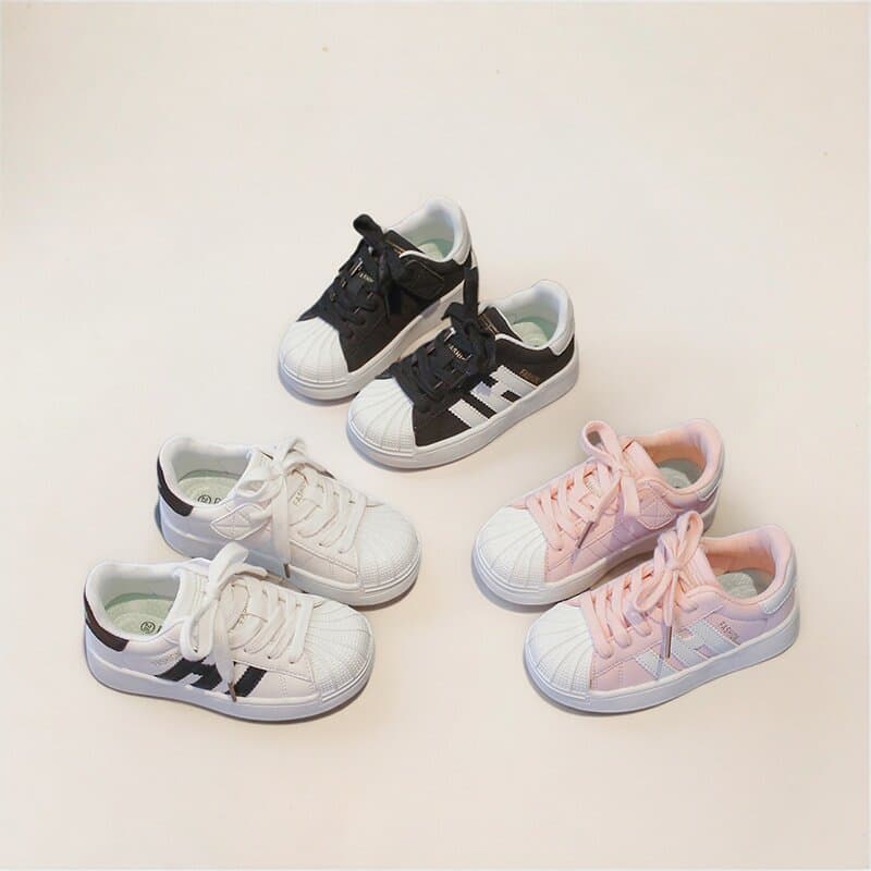 Tênis infantis 2026 primavera novo estilo respirável All-Match meninas sapatos brancos concha Toe meninos esportes casua