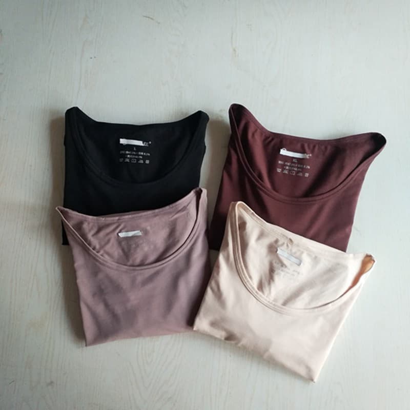 Produtos finais de manga comprida roupas de outono feminino Modal algodão em torno do pescoço camisa de fundo estirament