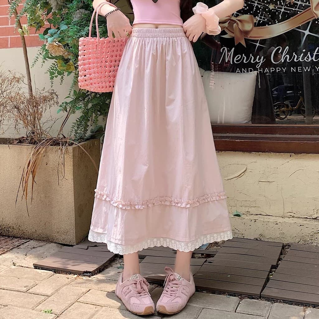Menina em saia rosa 2026 novo fungo dopamina Saia rosa pequena feminina 2026 novo estilo dopamina fungo Renda saia evasê