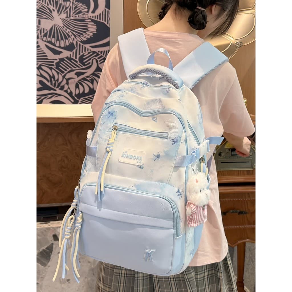 Tie-Dye Butterfly Schoolbag Feminino Alunos do ensino médio Reduzem a carga Mochila pequena fresca de alta aparência Moc