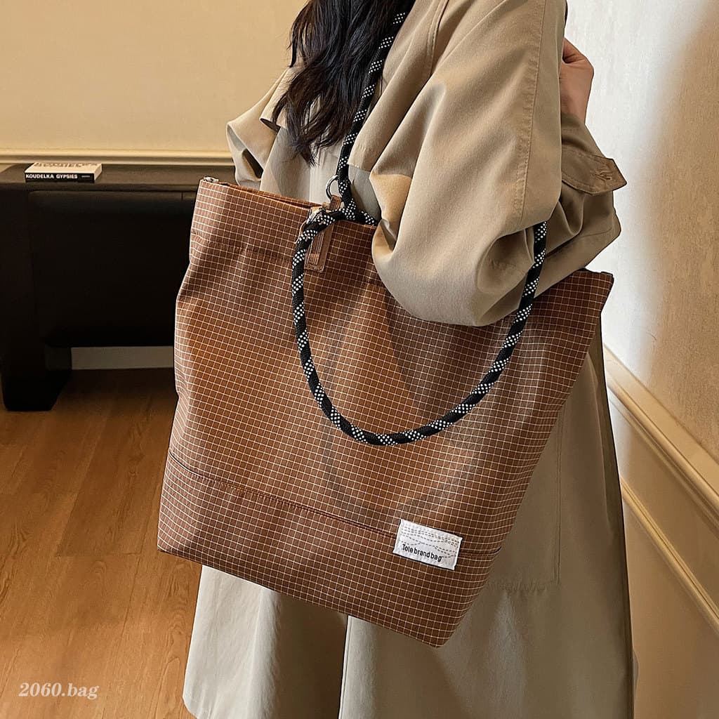 Versão coreana grande capacidade treliça ins balde saco 2025 All-Match elegante Casual simples moda na moda bolsa de omb