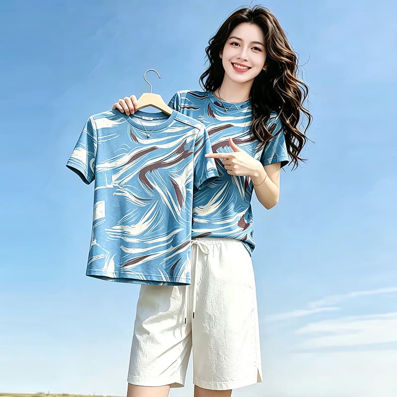 Camiseta feminina estampada de manga curta verão novo estilo solto mais magro olhar em torno do pescoço topo rápido