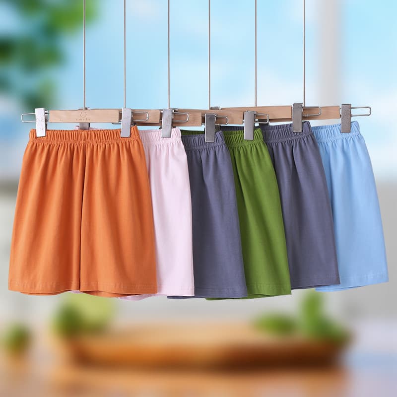Shorts casuais soltos de cinco pontos para crianças com estiramento de algodão puro