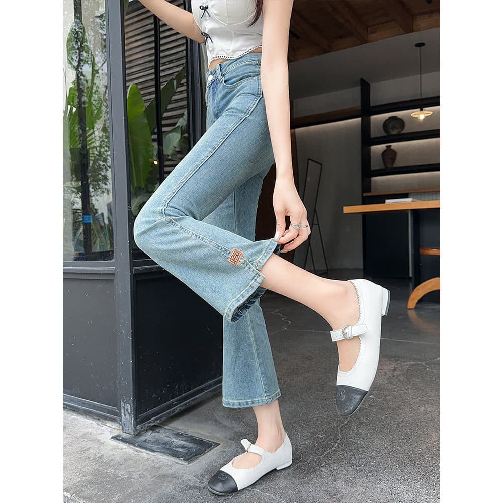 Calças jeans Micro-queimadas de cor clara femininas 2026 primavera Design sentido calças fenda pequena 150cm calças larg