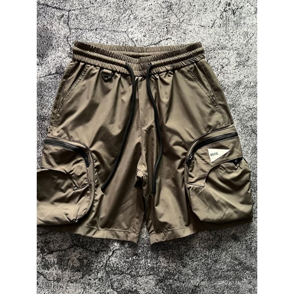 Verão Street Wear zíper grande bolso macacão Shorts masculino moda esportes solto Casual cor sólida calças médias de cin