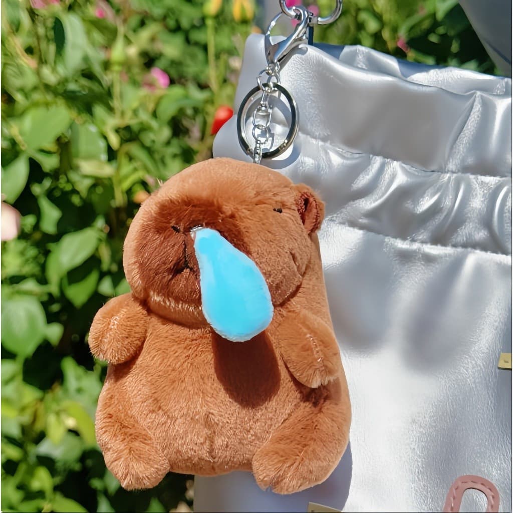 Capivara de pelúcia com bola retrátil automática, um bichinho de pelúcia único, macio e divertido.