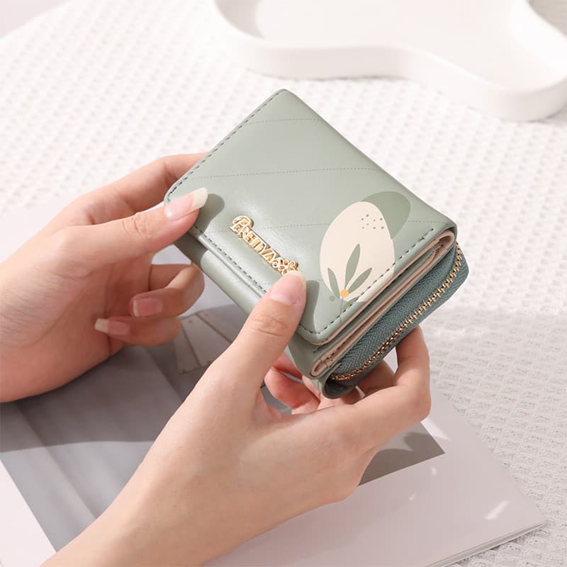 Carteira feminina 2024 primavera verão novo estilo senhoras carteira curta Multi-cartão dobrável órgão Tri-fold saco moe