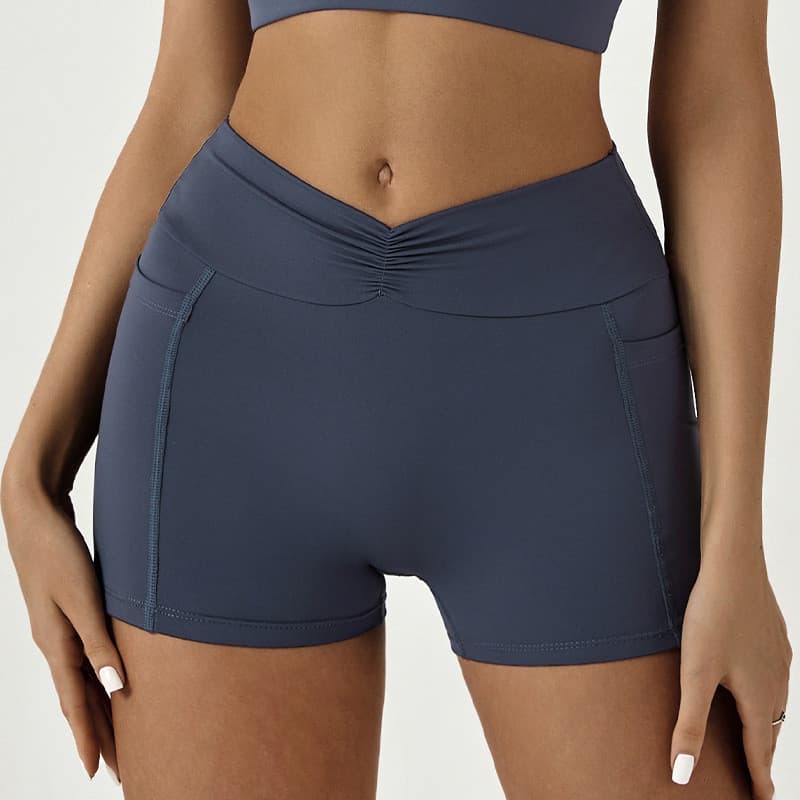 Mao's apertado pêssego Hip-Lifting Yoga frente cintura alta plissado bolso lateral Shorts de Fitness desgaste exterior e