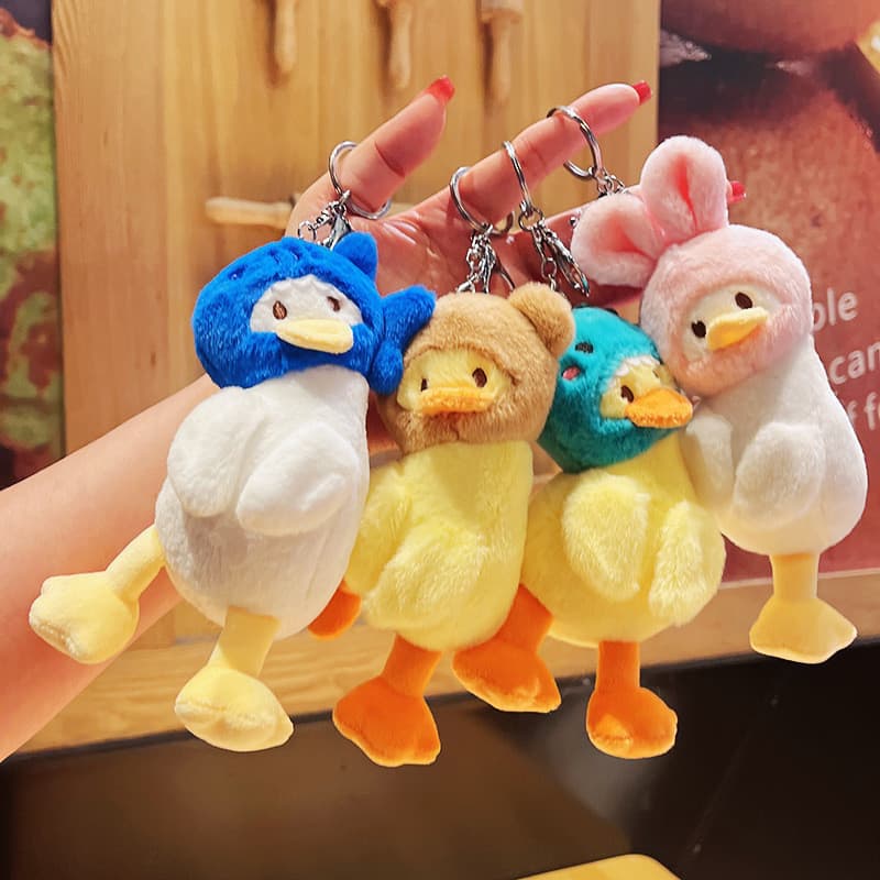 Desenhos animados dos desenhos animados chapelaria pato saco pingente de pelúcia chaveiro pingente agarrar boneca Mini c