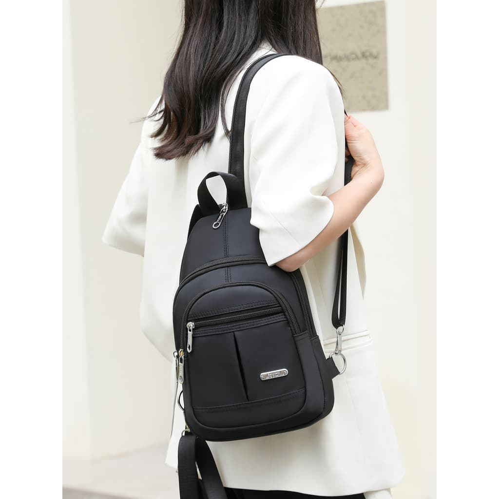 Oxford pano mochila 2026 novo estilo moda feminina All-Match Casual pequena mochila esportes Cross-corpo saco de peito M